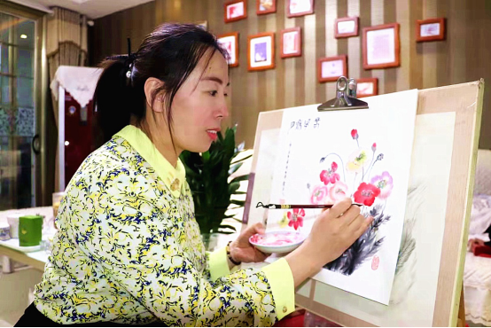 给“煤黑子”作画的人