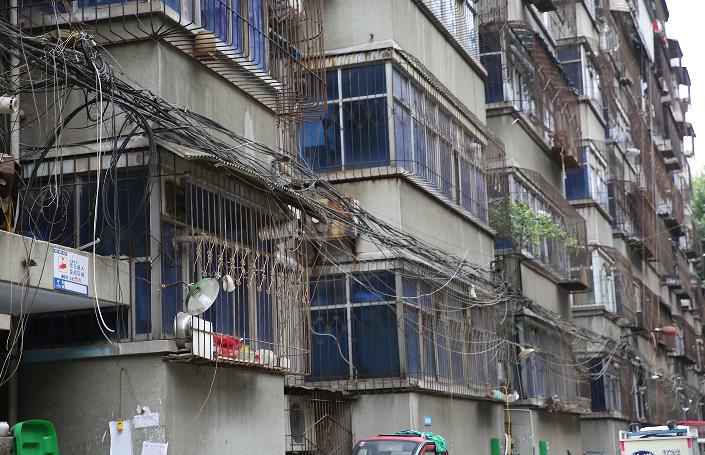 6个老破小楼院变身1个高大上小区解析合围连片推进老旧小区改造的郑州